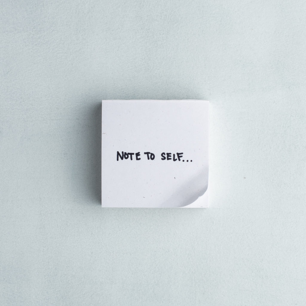 image of white notepad that says note to self on blue background